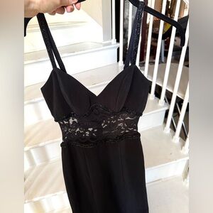 Formal beaded sleek bl dress with lace in the middle, size 4, great condition.